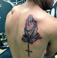 Praying Rosary Tattoo  best tattoo shop. Michigan piercings and tattoo